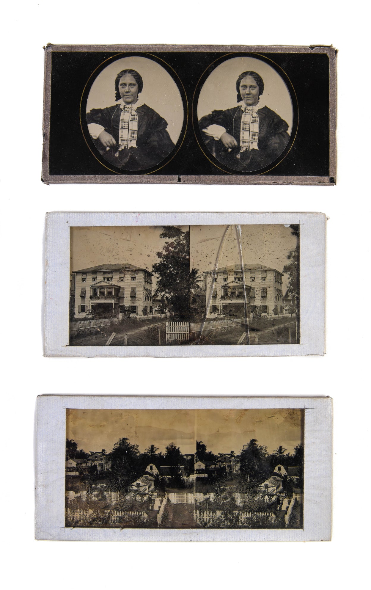 Three glass stereoviews.