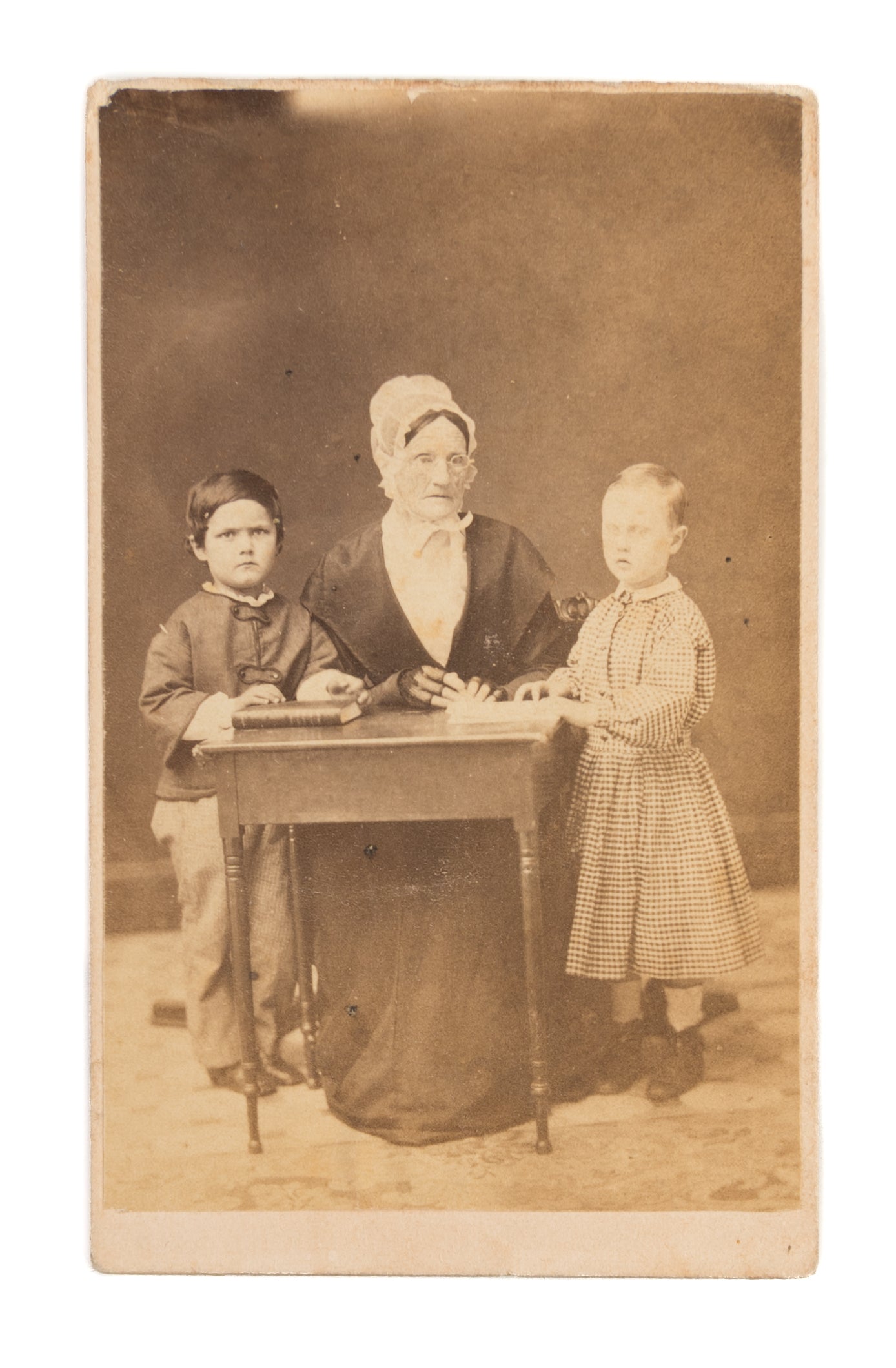 Two cabinet card photographs.