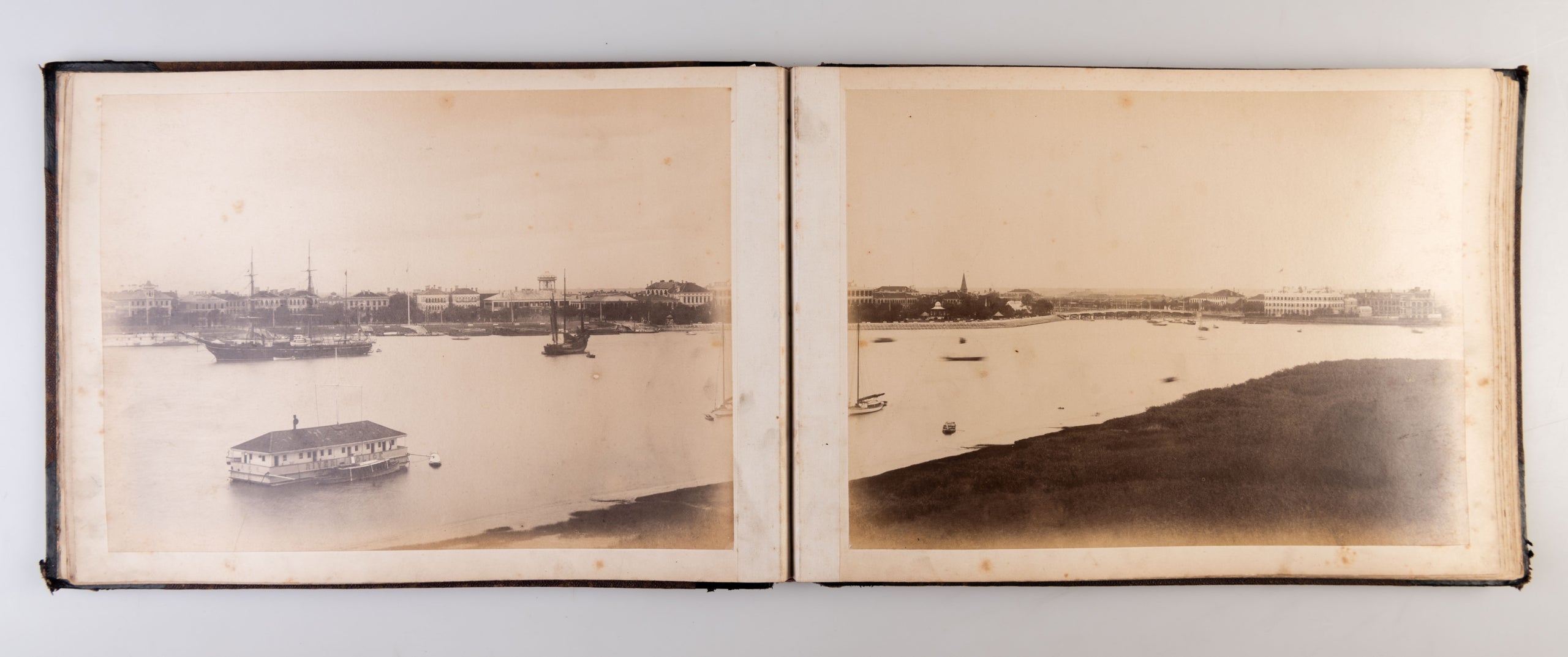 An album of 24 photographs of Shanghai and Peking.