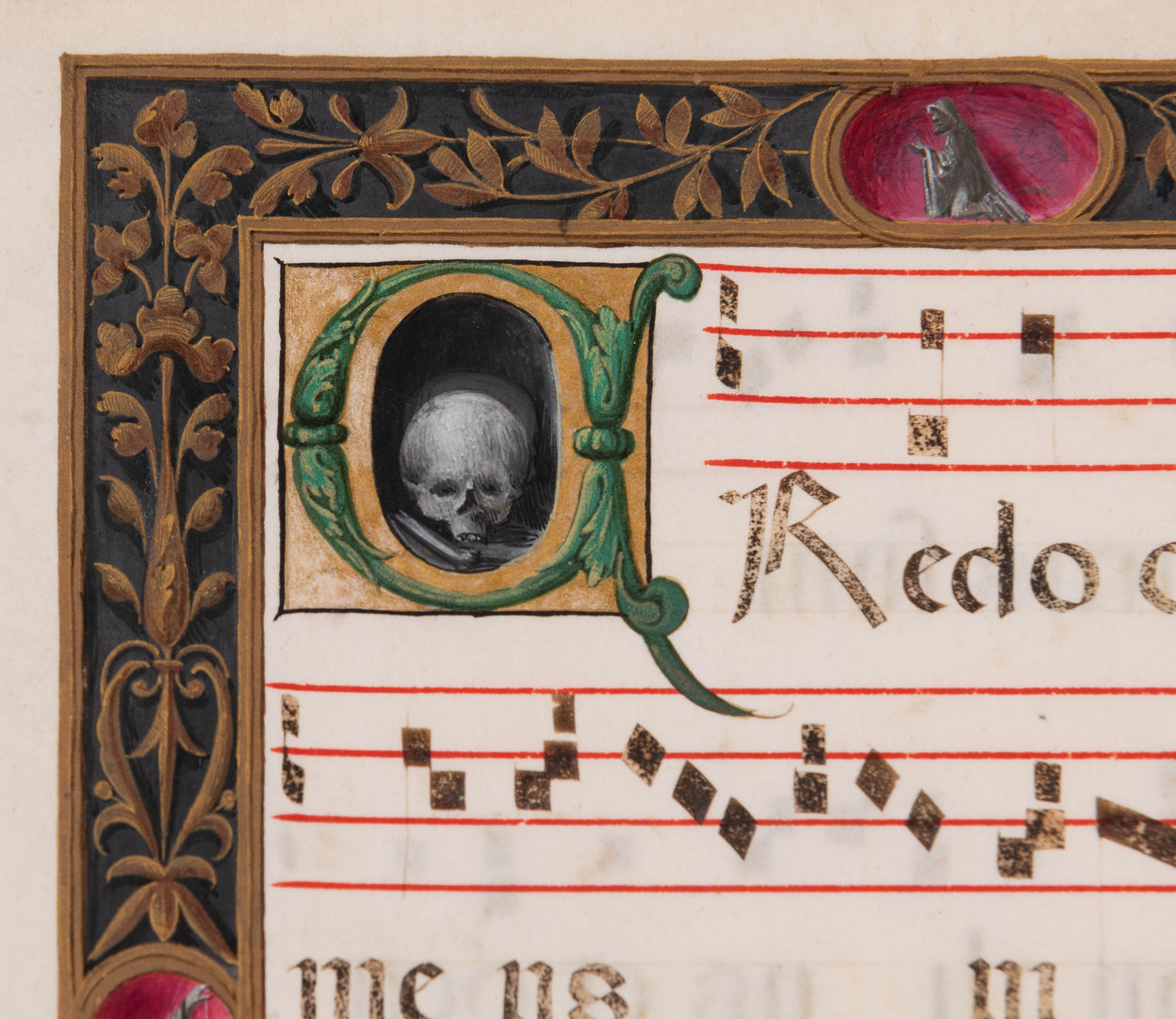 Processional leaf with historiated initial C containing skull & bone, illuminated manuscript on vellum.