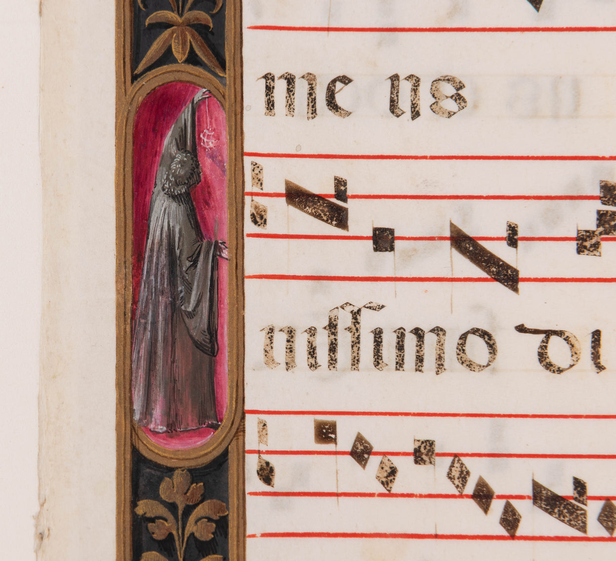 Processional leaf with historiated initial C containing skull & bone, illuminated manuscript on vellum.