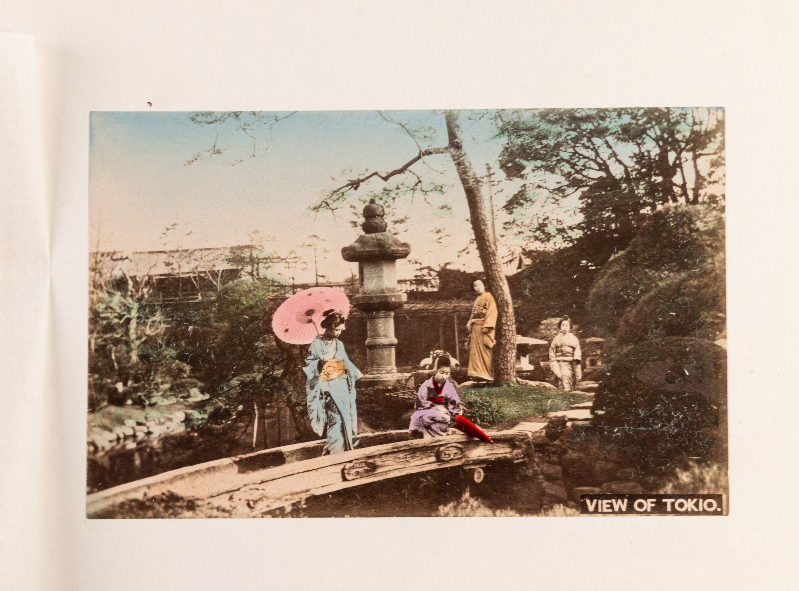 [Album of hand-coloured photographs showing famous sites of Japan]
