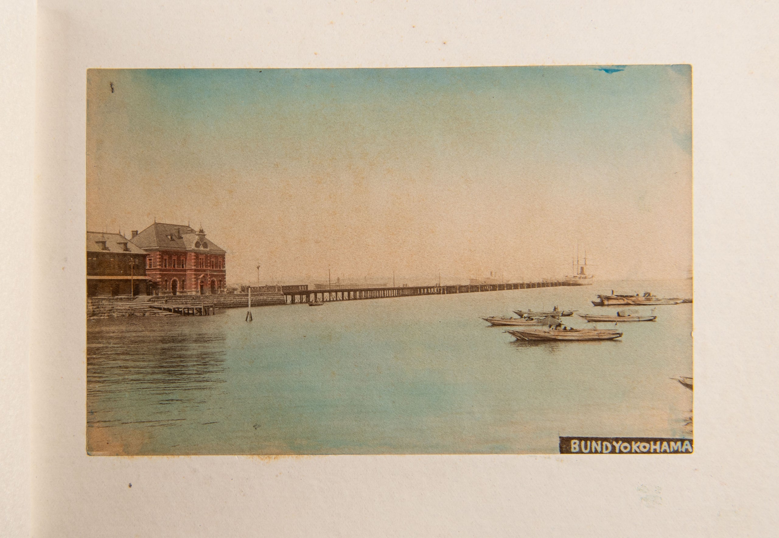 [Album of hand-coloured photographs showing famous sites of Japan]