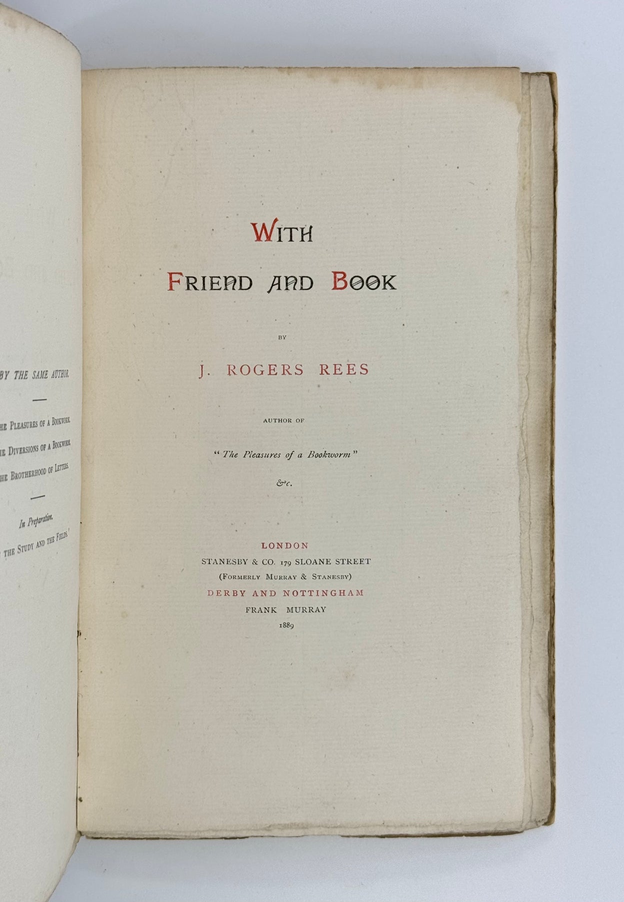 With Friend and Book.